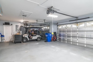 This *LARGER THAN IT LOOKS* 3 bedroom, 2.5 bath, oversized 2-car on  in Florida - for sale on GolfHomes.com, golf home, golf lot