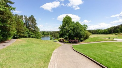 Hampton Golf Village! Stunning 3 sided brick home features the on Hampton Golf Village in Georgia - for sale on GolfHomes.com, golf home, golf lot