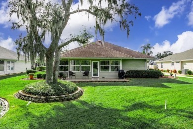 This *LARGER THAN IT LOOKS* 3 bedroom, 2.5 bath, oversized 2-car on  in Florida - for sale on GolfHomes.com, golf home, golf lot