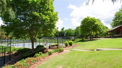 Hampton Golf Village! Stunning 3 sided brick home features the on Hampton Golf Village in Georgia - for sale on GolfHomes.com, golf home, golf lot