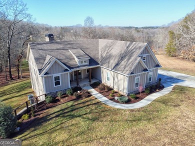 This stunning residence perfectly blends luxury, comfort, and on Old Union Golf Course in Georgia - for sale on GolfHomes.com, golf home, golf lot