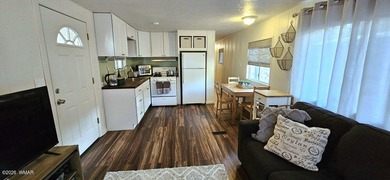 Tucked among the tall pines of Pinetop Lakes Country Club, this on Pinetop Lakes Golf and Country Club in Arizona - for sale on GolfHomes.com, golf home, golf lot