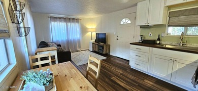 Tucked among the tall pines of Pinetop Lakes Country Club, this on Pinetop Lakes Golf and Country Club in Arizona - for sale on GolfHomes.com, golf home, golf lot