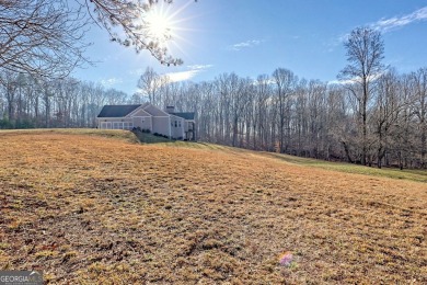 This stunning residence perfectly blends luxury, comfort, and on Old Union Golf Course in Georgia - for sale on GolfHomes.com, golf home, golf lot