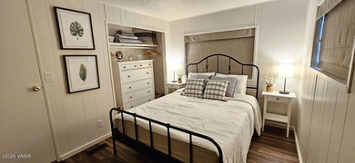 Tucked among the tall pines of Pinetop Lakes Country Club, this on Pinetop Lakes Golf and Country Club in Arizona - for sale on GolfHomes.com, golf home, golf lot