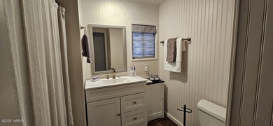 Tucked among the tall pines of Pinetop Lakes Country Club, this on Pinetop Lakes Golf and Country Club in Arizona - for sale on GolfHomes.com, golf home, golf lot