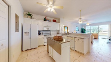 Enjoy breathtaking WATER AND CANAL VIEWS from the comfort of on Saint Andrews South Golf Club in Florida - for sale on GolfHomes.com, golf home, golf lot