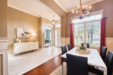 Stunning 4-Bedroom Pool Home with Office  Bonus Room in Gated on Heritage Isles Golf and Country Club in Florida - for sale on GolfHomes.com, golf home, golf lot
