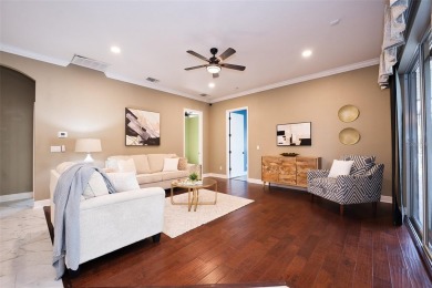 Stunning 4-Bedroom Pool Home with Office  Bonus Room in Gated on Heritage Isles Golf and Country Club in Florida - for sale on GolfHomes.com, golf home, golf lot