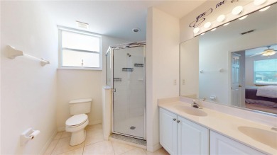 Enjoy breathtaking WATER AND CANAL VIEWS from the comfort of on Saint Andrews South Golf Club in Florida - for sale on GolfHomes.com, golf home, golf lot