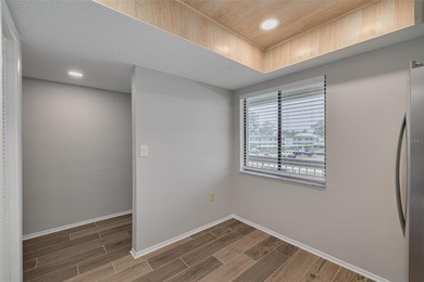 Welcome home to this beautifully updated second-floor condo on East Lake Woodlands Country Club in Florida - for sale on GolfHomes.com, golf home, golf lot