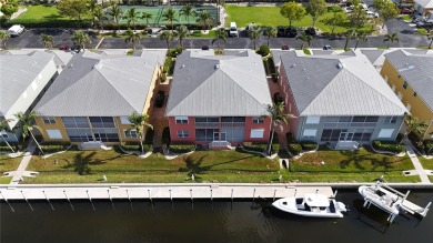 Enjoy breathtaking WATER AND CANAL VIEWS from the comfort of on Saint Andrews South Golf Club in Florida - for sale on GolfHomes.com, golf home, golf lot