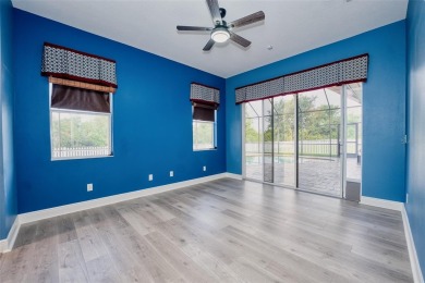 Stunning 4-Bedroom Pool Home with Office  Bonus Room in Gated on Heritage Isles Golf and Country Club in Florida - for sale on GolfHomes.com, golf home, golf lot