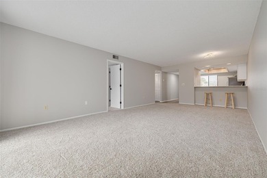 Welcome home to this beautifully updated second-floor condo on East Lake Woodlands Country Club in Florida - for sale on GolfHomes.com, golf home, golf lot