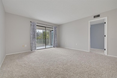 Welcome home to this beautifully updated second-floor condo on East Lake Woodlands Country Club in Florida - for sale on GolfHomes.com, golf home, golf lot