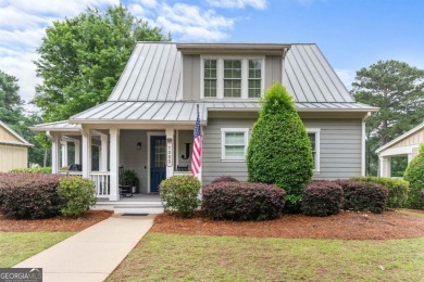 Welcome to this charming 3-bedroom, 3.5-bathroom Landing cottage on Reynolds Lake Oconee - The Landing in Georgia - for sale on GolfHomes.com, golf home, golf lot