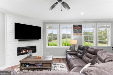 Welcome to this charming 3-bedroom, 3.5-bathroom Landing cottage on Reynolds Lake Oconee - The Landing in Georgia - for sale on GolfHomes.com, golf home, golf lot