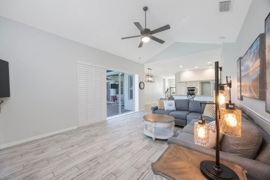 Welcome to this beautifully updated 4-bedroom, 3-bath home in on River Wilderness Golf and Country Club in Florida - for sale on GolfHomes.com, golf home, golf lot