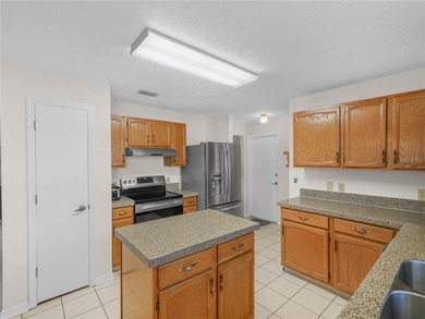 Comfortable living in highly desirable SANDPIPER GOLF COMMUNITY on Sandpiper Golf Club in Florida - for sale on GolfHomes.com, golf home, golf lot