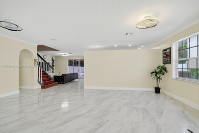 Spacious 5BR, 2.5BA home in Madison Green, Royal Palm Beach on The Links At Madison Green in Florida - for sale on GolfHomes.com, golf home, golf lot