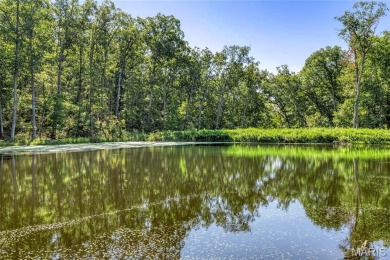 Discover the perfect blend of beauty and tranquility on this on Innsbrook Resort Golf Course in Missouri - for sale on GolfHomes.com, golf home, golf lot