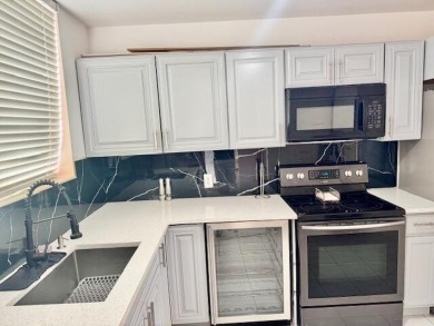 Great and spacious townhouse in one of the most desirable gated on Fountains Golf and Country Club in Florida - for sale on GolfHomes.com, golf home, golf lot