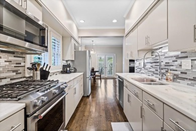 This 2 bed, 2 and 1/2 bath ALL BRICK END UNIT TOWNHOME offers on Ansley Golf Club At Mid-Town in Georgia - for sale on GolfHomes.com, golf home, golf lot