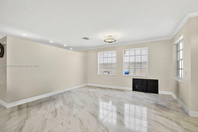 Spacious 5BR, 2.5BA home in Madison Green, Royal Palm Beach on The Links At Madison Green in Florida - for sale on GolfHomes.com, golf home, golf lot