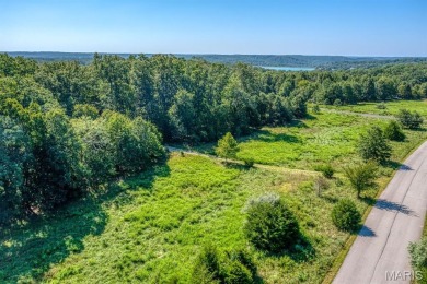 Discover the perfect blend of beauty and tranquility on this on Innsbrook Resort Golf Course in Missouri - for sale on GolfHomes.com, golf home, golf lot