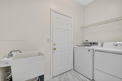 Spacious 5BR, 2.5BA home in Madison Green, Royal Palm Beach on The Links At Madison Green in Florida - for sale on GolfHomes.com, golf home, golf lot