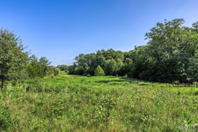 Discover the perfect blend of beauty and tranquility on this on Innsbrook Resort Golf Course in Missouri - for sale on GolfHomes.com, golf home, golf lot