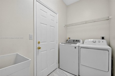 Spacious 5BR, 2.5BA home in Madison Green, Royal Palm Beach on The Links At Madison Green in Florida - for sale on GolfHomes.com, golf home, golf lot