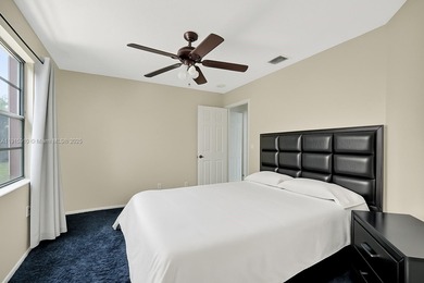 Spacious 5BR, 2.5BA home in Madison Green, Royal Palm Beach on The Links At Madison Green in Florida - for sale on GolfHomes.com, golf home, golf lot