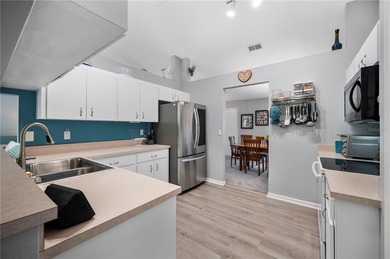 Welcome to this beautifully maintained 3-bedroom, 2 bath home on Oakwood Golf Club in Florida - for sale on GolfHomes.com, golf home, golf lot