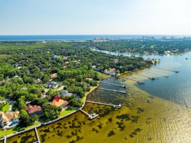 WESTWARD-FACING SINGLE-STORY WATERFRONT ESTATE WITHIN ESTEEMED on Kelly Plantation Golf Club in Florida - for sale on GolfHomes.com, golf home, golf lot