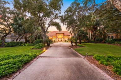 WESTWARD-FACING SINGLE-STORY WATERFRONT ESTATE WITHIN ESTEEMED on Kelly Plantation Golf Club in Florida - for sale on GolfHomes.com, golf home, golf lot