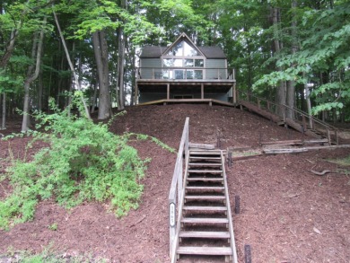 Beautifully brought back to life with tree top views on Treasure Lake - Gold in Pennsylvania - for sale on GolfHomes.com, golf home, golf lot