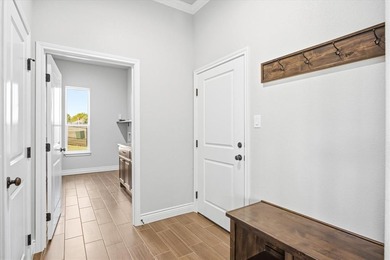 Custom Home in an excellent location on the Granbury Golf Course on Granbury Country Club in Texas - for sale on GolfHomes.com, golf home, golf lot