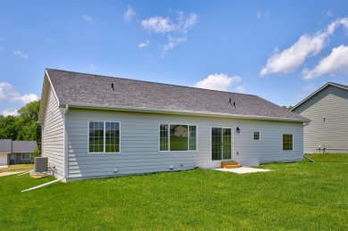 Welcome to this beautifully designed new construction home on Osceola Country Club in Iowa - for sale on GolfHomes.com, golf home, golf lot