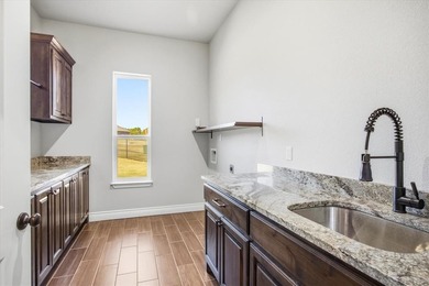 Custom Home in an excellent location on the Granbury Golf Course on Granbury Country Club in Texas - for sale on GolfHomes.com, golf home, golf lot