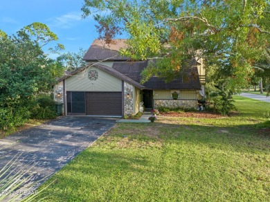 Nestled in the highly desirable gated community of Pelican Bay on The Club At Pelican Bay - North Course in Florida - for sale on GolfHomes.com, golf home, golf lot