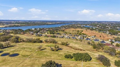 Custom Home in an excellent location on the Granbury Golf Course on Granbury Country Club in Texas - for sale on GolfHomes.com, golf home, golf lot