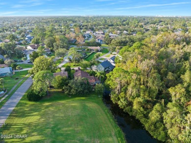 Nestled in the highly desirable gated community of Pelican Bay on The Club At Pelican Bay - North Course in Florida - for sale on GolfHomes.com, golf home, golf lot