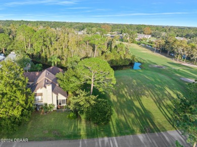 Nestled in the highly desirable gated community of Pelican Bay on The Club At Pelican Bay - North Course in Florida - for sale on GolfHomes.com, golf home, golf lot