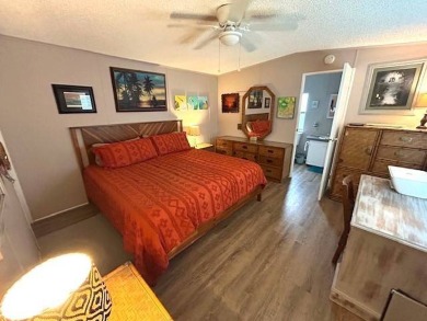 Discover this lovely furnished 2-bedroom, 2-bathroom single-wide on Crystal Lake Club in Florida - for sale on GolfHomes.com, golf home, golf lot