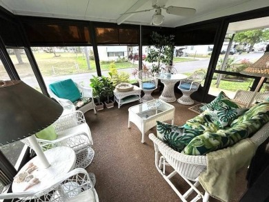 Discover this lovely furnished 2-bedroom, 2-bathroom single-wide on Crystal Lake Club in Florida - for sale on GolfHomes.com, golf home, golf lot