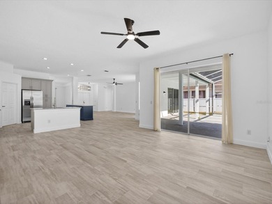 Located in a gated golf course community, 411 Boxwood Dr has on Ridgewood Lakes Golf and Country Club in Florida - for sale on GolfHomes.com, golf home, golf lot