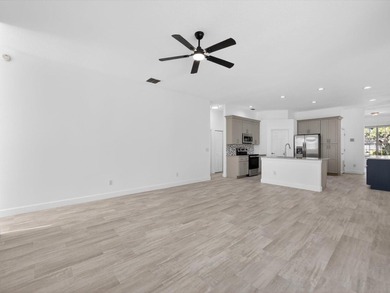 Located in a gated golf course community, 411 Boxwood Dr has on Ridgewood Lakes Golf and Country Club in Florida - for sale on GolfHomes.com, golf home, golf lot