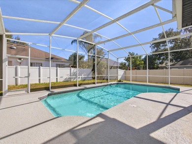 Located in a gated golf course community, 411 Boxwood Dr has on Ridgewood Lakes Golf and Country Club in Florida - for sale on GolfHomes.com, golf home, golf lot