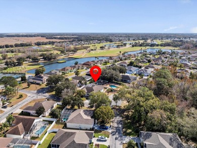 Located in a gated golf course community, 411 Boxwood Dr has on Ridgewood Lakes Golf and Country Club in Florida - for sale on GolfHomes.com, golf home, golf lot